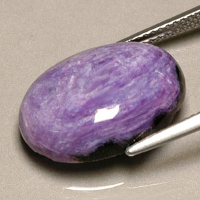 Caroite naturale viola da 9,97 ct, taglio ovale, opaco