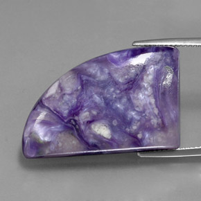 Caroite naturale viola da 33,40 ct, forma fantasia, opaco