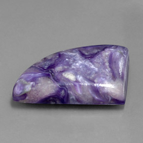 Caroite naturale viola da 33,40 ct, forma fantasia, opaco