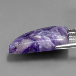 Caroite naturale viola da 33,40 ct, forma fantasia, opaco