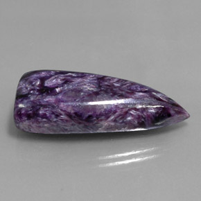 Caroite naturale viola da 27,21 ct, forma fantasia, opaco