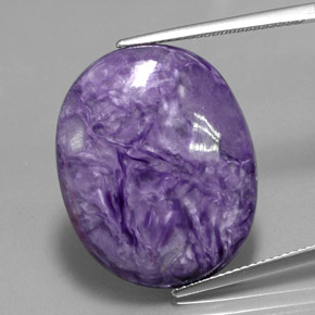 Caroite naturale viola da 26,05 ct, taglio ovale, opaco