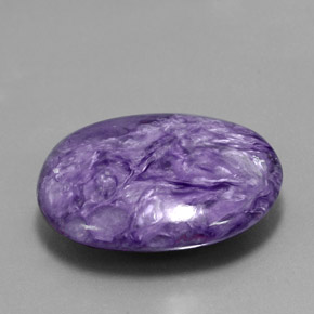Caroite naturale viola da 26,05 ct, taglio ovale, opaco