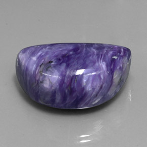 Caroite naturale viola da 60,66 ct, forma fantasia, opaco
