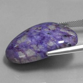 Caroite viola naturale da 38,79 ct, forma fantasia, opaco