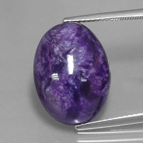 Caroite naturale viola da 10,76 ct, taglio ovale, opaco