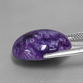 Caroite naturale viola da 10,76 ct, taglio ovale, opaco