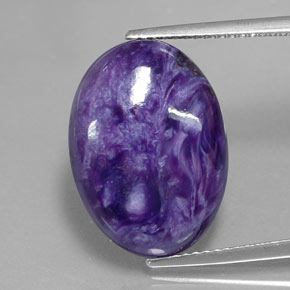Caroite naturale viola da 9,60 ct, taglio ovale, opaco