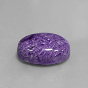 Caroite naturale viola da 11,80 ct, taglio ovale, opaco