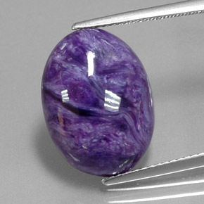 Caroite naturale viola da 9,57 ct, taglio ovale, opaco