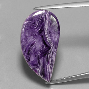 Caroite naturale viola da 18,29 ct, forma fantasia, opaco