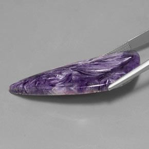 Caroite naturale viola da 40,30 ct, forma fantasia, opaco