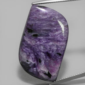 Caroite naturale viola da 29,51 ct, forma fantasia, opaco