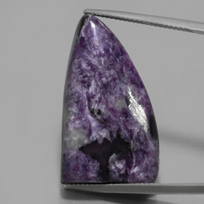 Caroite naturale viola da 33,50 ct, forma fantasia, opaco