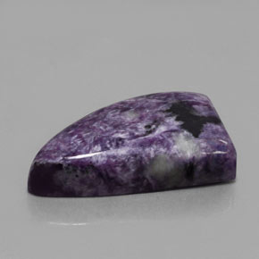 Caroite naturale viola da 33,50 ct, forma fantasia, opaco