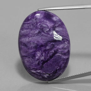 Caroite naturale viola da 28,09 ct, taglio ovale, opaco