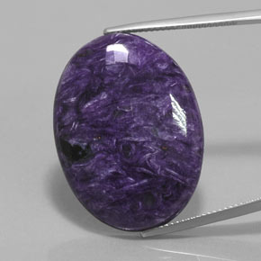 Caroite viola naturale da 28,54 ct, taglio ovale, opaco
