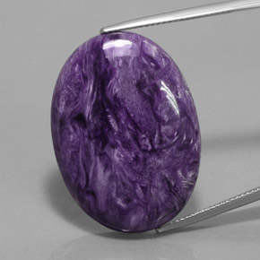 Caroite naturale viola da 27,90 ct, taglio ovale, opaco