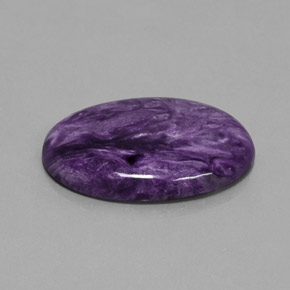 Caroite naturale viola da 27,90 ct, taglio ovale, opaco