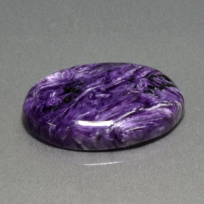 Caroite naturale viola da 13,86 ct, taglio ovale, opaco