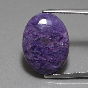Caroite viola naturale da 11,80 ct, taglio ovale, opaco