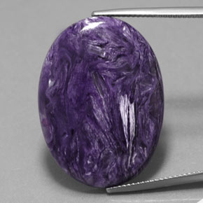 Caroite viola naturale da 24,63 ct, taglio ovale, opaco