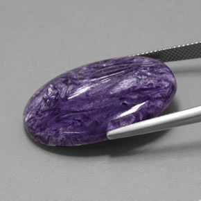Caroite viola naturale da 24,63 ct, taglio ovale, opaco