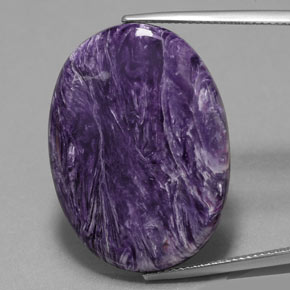 Caroite naturale viola da 25,13 ct, taglio ovale, opaco