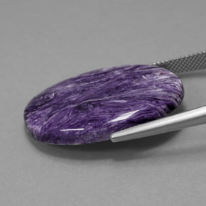 Caroite naturale viola da 25,13 ct, taglio ovale, opaco