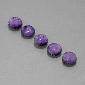 Caroite naturale viola da  ct, taglio rotondo, opaco