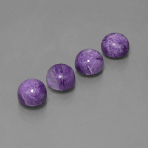 Caroite naturale viola da  ct, taglio rotondo, opaco