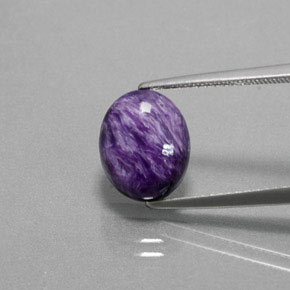 Caroite naturale viola da 3,35 ct, taglio ovale, opaco