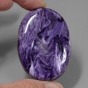 Caroite naturale viola da 84,76 ct, taglio ovale, opaco