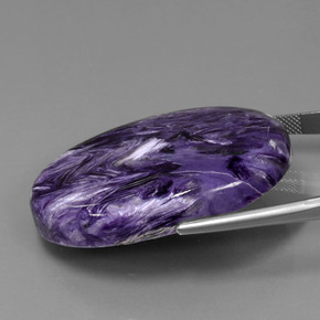 Caroite naturale viola da 84,76 ct, taglio ovale, opaco