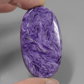Caroite naturale viola da 52,34 ct, taglio ovale, opaco