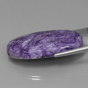Caroite naturale viola da 52,34 ct, taglio ovale, opaco