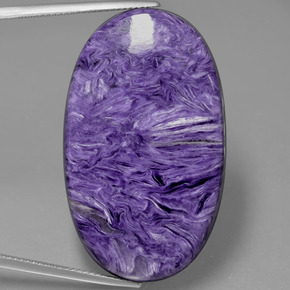 Caroite naturale viola da 53,84 ct, taglio ovale, opaco