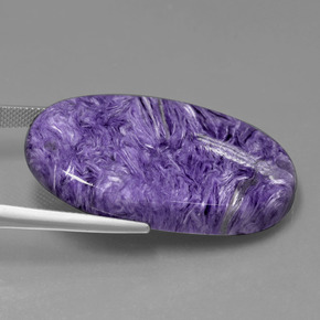 Caroite naturale viola da 53,84 ct, taglio ovale, opaco