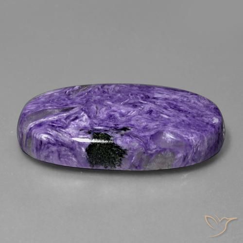 Caroite naturale viola da 55,43 ct, taglio ovale, opaco