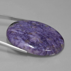 Caroite viola naturale da 108,93 ct, taglio ovale, opaco