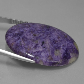 Caroite naturale viola da 83,59 ct, taglio ovale, opaco