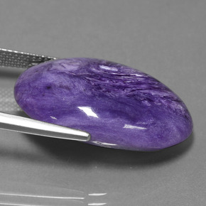 Caroite naturale viola da 22,88 ct, taglio ovale, opaco