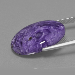 Caroite naturale viola da 14,65 ct, taglio ovale, opaco