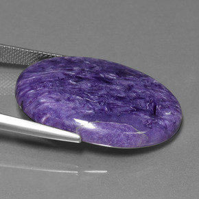 Caroite naturale viola da 27,82 ct, taglio ovale, opaco