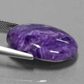 Caroite naturale viola da 16,36 ct, taglio ovale, opaco