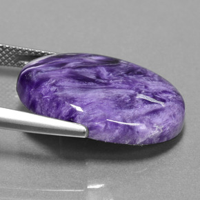 Caroite naturale viola da 13,36 ct, taglio ovale, opaco