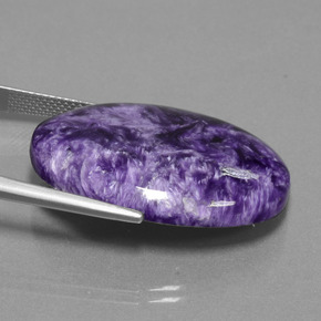 Caroite naturale viola da 29,03 ct, taglio ovale, opaco