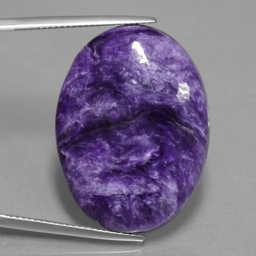 Caroite naturale viola da 29,80 ct, taglio ovale, opaco