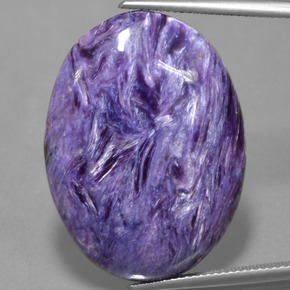 Caroite naturale viola da 31,73 ct, taglio ovale, opaco