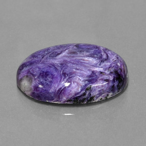 Caroite naturale viola da 22,50 ct, taglio ovale, opaco